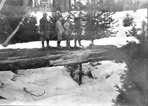 Railroad construction workers in snow