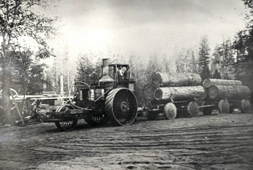 Steam Tractor Pulling Wooden Wheel Cart