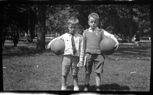 Boys Holding Basketballs