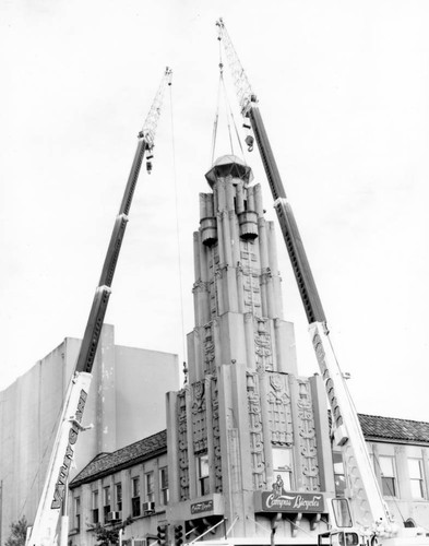 Cranes dismantling tower on Senator Theater building, March, 1999