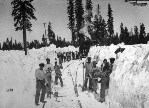 Railroad Workers in Snow