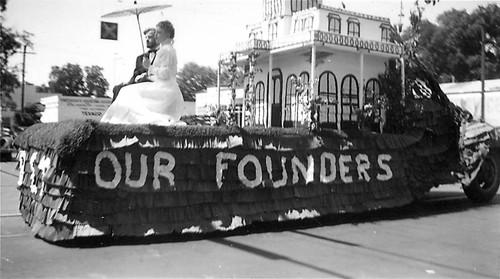 [Pioneer Week float] with Valerie Hall and unknown male on 'Our Founders' float