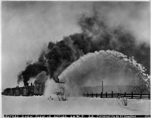 Western Pacific Railroad snow plow in action, 1911