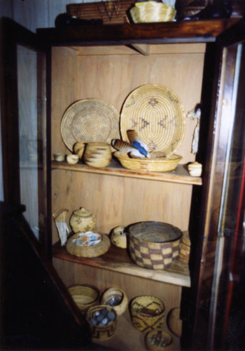 Baskets in display cabinet