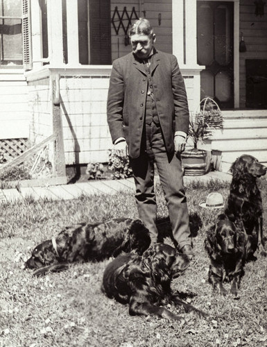 Dr. George Westlake with Four Dogs