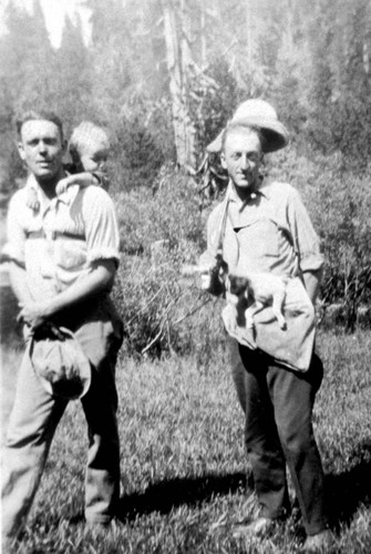 Two men and a baby at Grizzly Lake