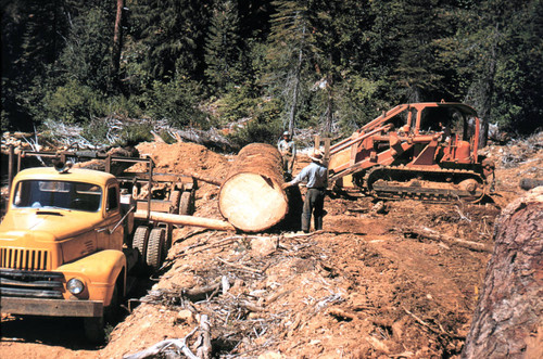 Loading log onto truck--Soper-Wheeler Company