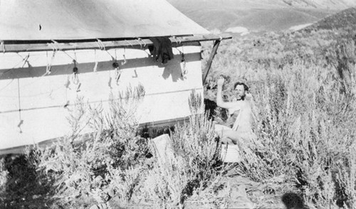 Railroad construction worker in washtub