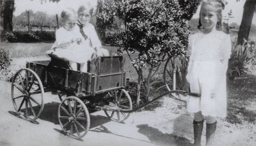 Dorothy pulling Donald and Glenn Camper in wagon