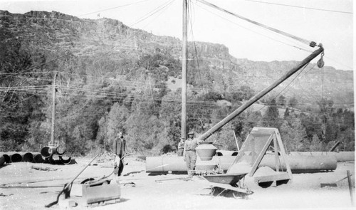 Laborers installing new pipeline