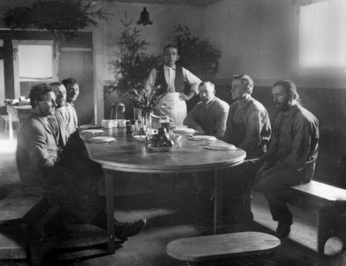 Men at table in Sawyers Bar area