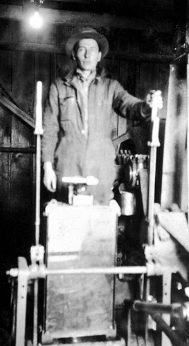 Man at controls of a hoist