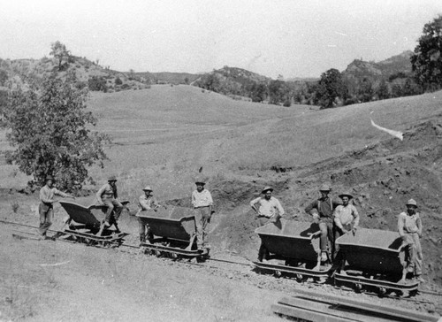 Workers on Rail Cars