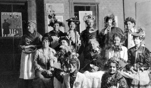 Women wearing what appear to be 1890s costumes