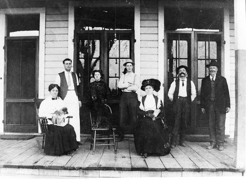 Group of people in front of Buck McCollum Hotel