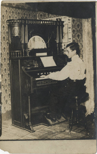 Boy Playing Organ