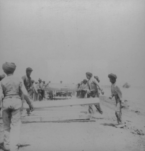 Workers laying railroad tracks for Sacramento Northern for Chico