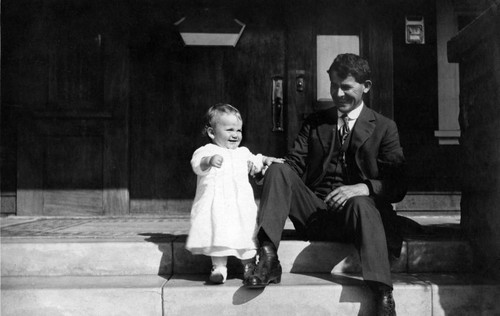 John Nopel, Jr. standing with father John Nopel, Sr