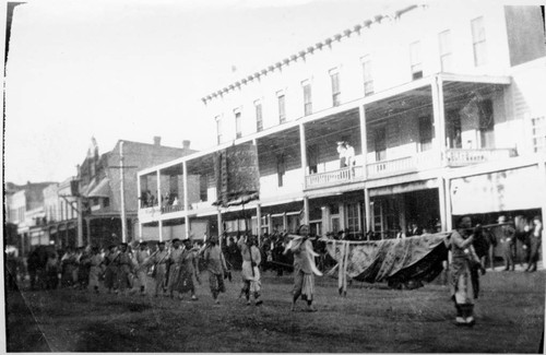 Chinese Procession in Front of Johnson House