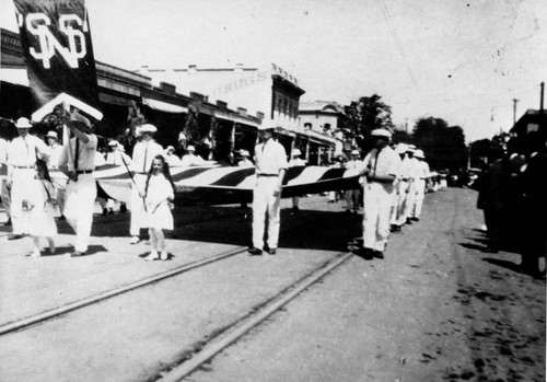 Parade with Large Flag