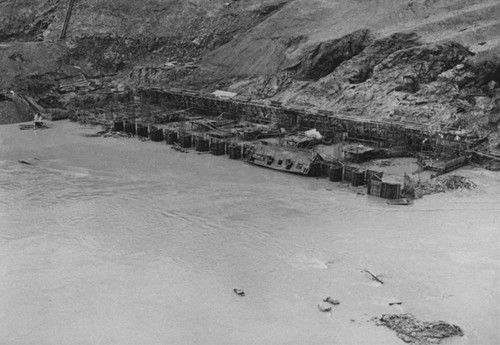 Flood waters at Shasta Dam construction site