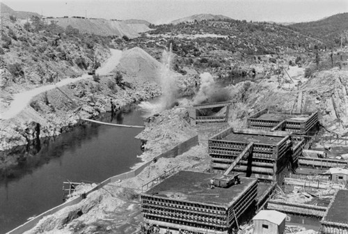 Blasting of dike to divert Sacramento River at Shasta Dam construction site