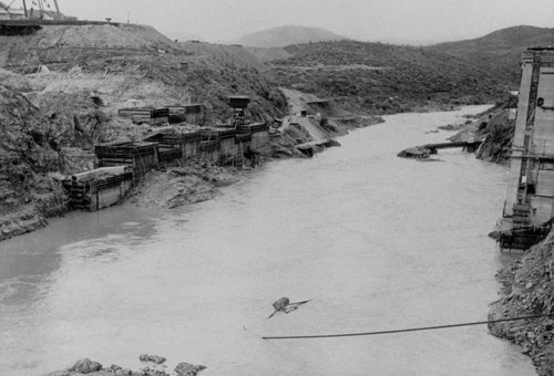 Flood waters at Shasta Dam construction site