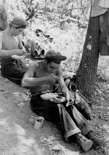 CCC enrollee having lunch during Shasta Dam construction