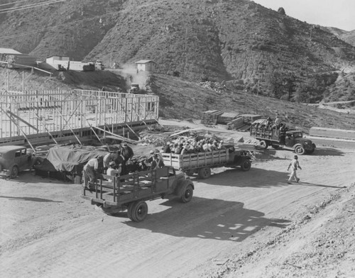 Workmen leaving jog at Shasta Dam construction site