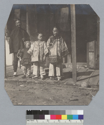 [father with three children]