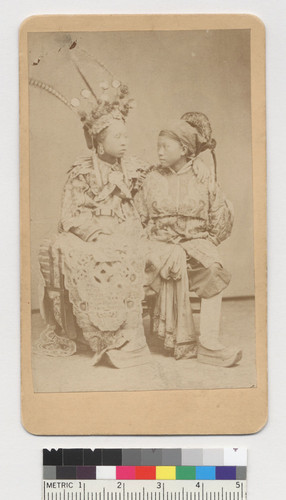 [two young performers in costume]