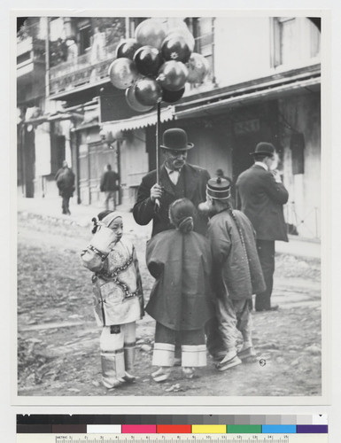 [Chinese children and balloon salesman]