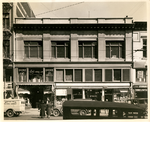 City Market building, east side of Washington Street between 12th and 13th Streets in downtown Oakland, California. Lewis Shoes, New City Market in view