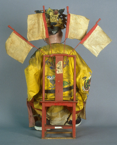 Puppet, male figure with four flags, yellow, green & silver dragon