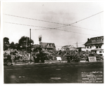 Workers sort through rubble prior to construction of the Sears, Roebuck and Co., Telegraph Avenue and 27th Street, in Oakland, California