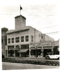 Exposed streetcar tracks in front of the Free Market and Claremont Builders Exchange buildings, College Avenue between Ocean View Drive and Keith Avenue