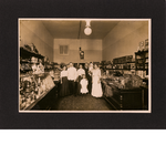 Hallerstede family pose inside their bakery and delicatessen on San Pablo Avenue between 19th and William Streets in Oakland