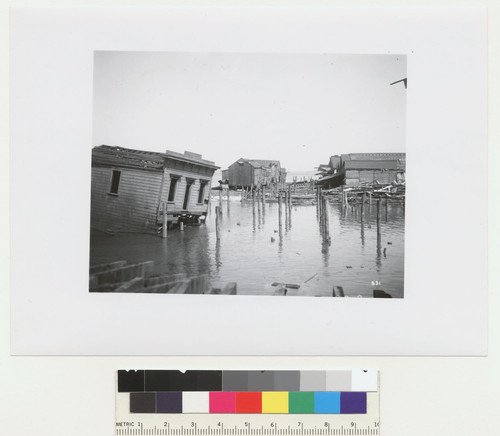 San Francisco waterfront. 1906. [View of damage to buildings and piers. No. 831.]