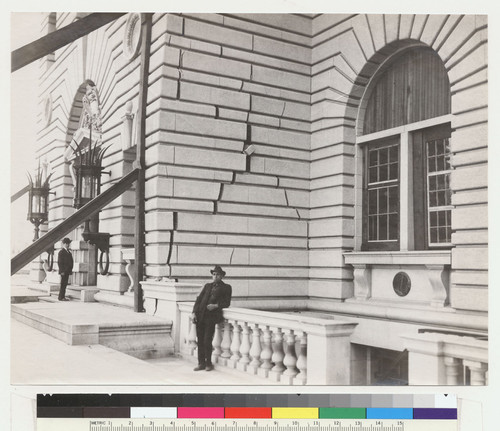 Rear of P.O. [Man posing at U.S. Post Office, Mission St.]