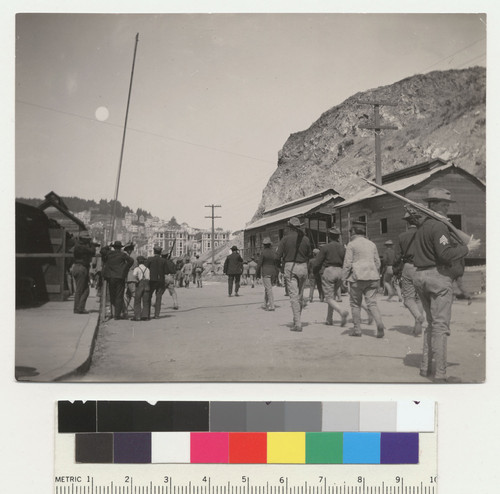 Duboce & Market St. Known as Market St. Cut. April 27, 1906. [Soldiers and civilians in street.]