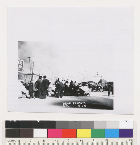 [Street scene showing refugees with possessions. Unidentified location. No. 575.]