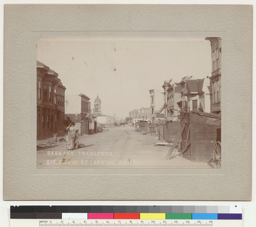 Baggage transferd [sic]. Grove St. looking east. [Woman pulling wheeled cart. City Hall in distance, left center; street kitchens, right. No. 518.]