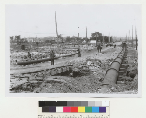 [Installation of pipeline along unidentified street. Mission district?]