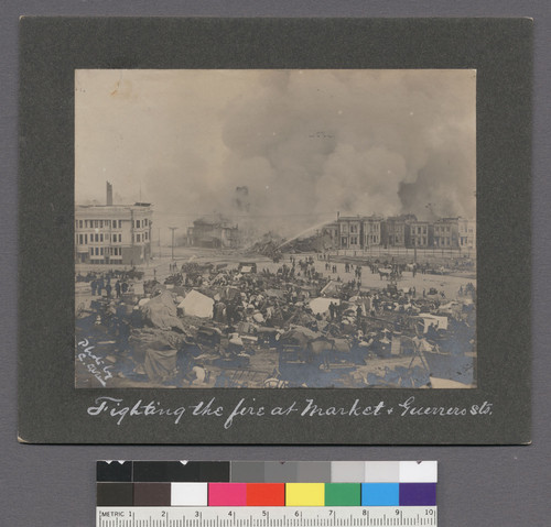 Fighting the fire at Market & Guerrero Sts. [verso: "Fighting the fire at Market & Guerrero Sts. on the aft. of the second day, Apr. 19th, '06. 2nd in series of three panoramic views showing the time of fire on that afternoon