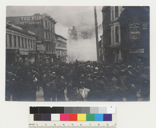 O'Farrell St. (100 block) [Crowd in street gathered to watch fire.]