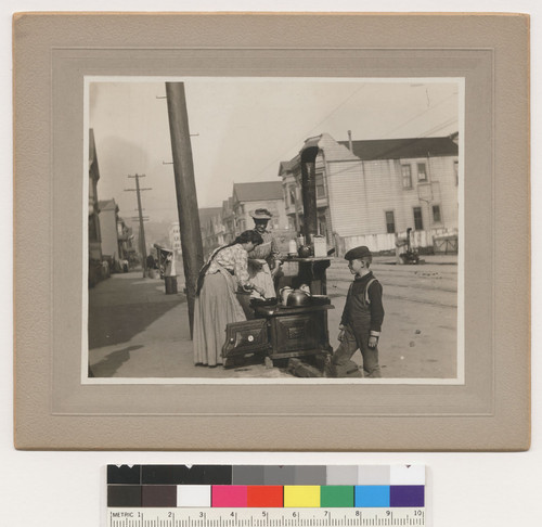 1906--17th [Seventeenth] & Castro. Standing woman is Mary Eissler. [Family at sidewalk.]