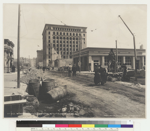 Montgomery St. north from Sutter St. July 26, 1906. [Newly erected building for Donohoe Kelly Banking Co. Mills Building at Montgomery and Bush Sts., left center. No. 313.]