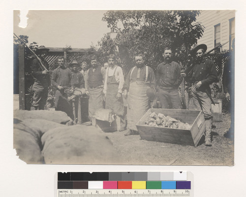 [Soldiers and butchers with meat provisions. Unidentified location.]