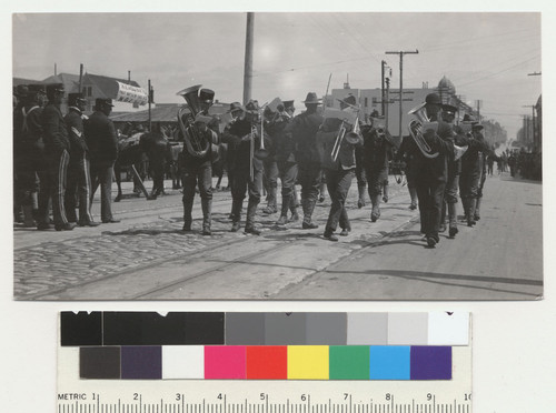 U.S. Army band. [Marching down unidentified street.]