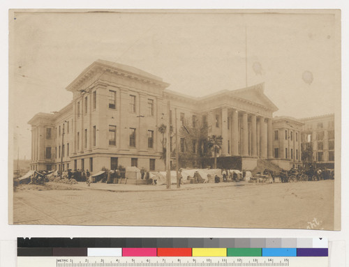 Refugees near the U.S. Mint, the only building in the down town district to escape injury from earthquake and fire of April 18, 1906. San Francisco